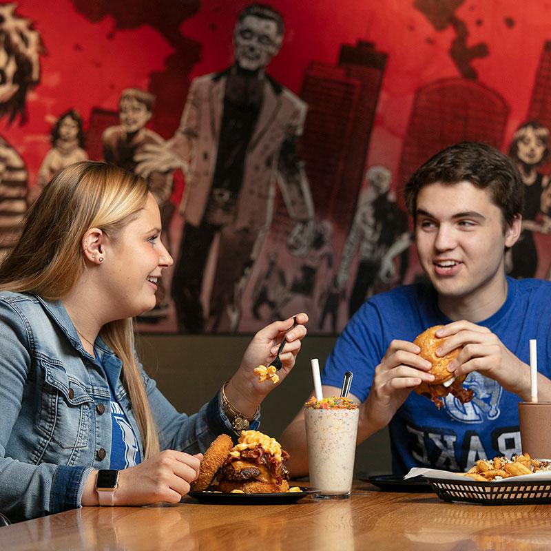 Two Drake students enjoying downtown Des Moines dining